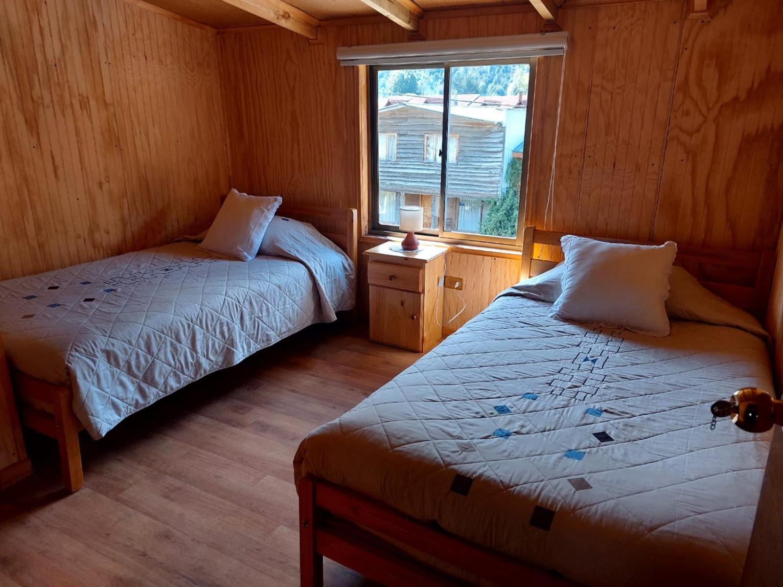 Hostal Y Cabanas Ventisquero Puerto Puyuguapi Exteriör bild