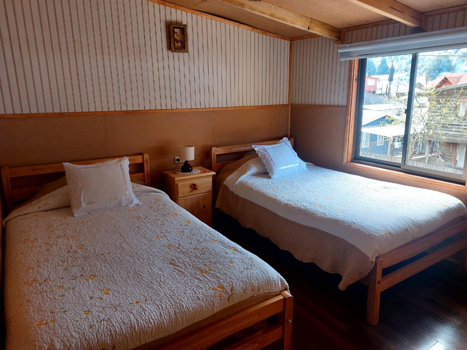 Hostal Y Cabanas Ventisquero Puerto Puyuguapi Exteriör bild